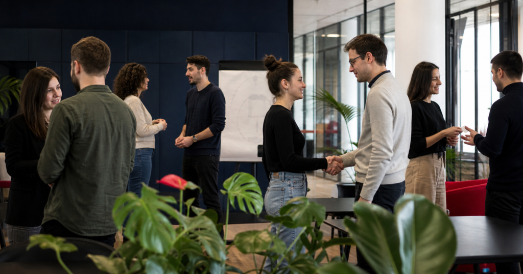 People practising business conversations in the Supertree coworking space