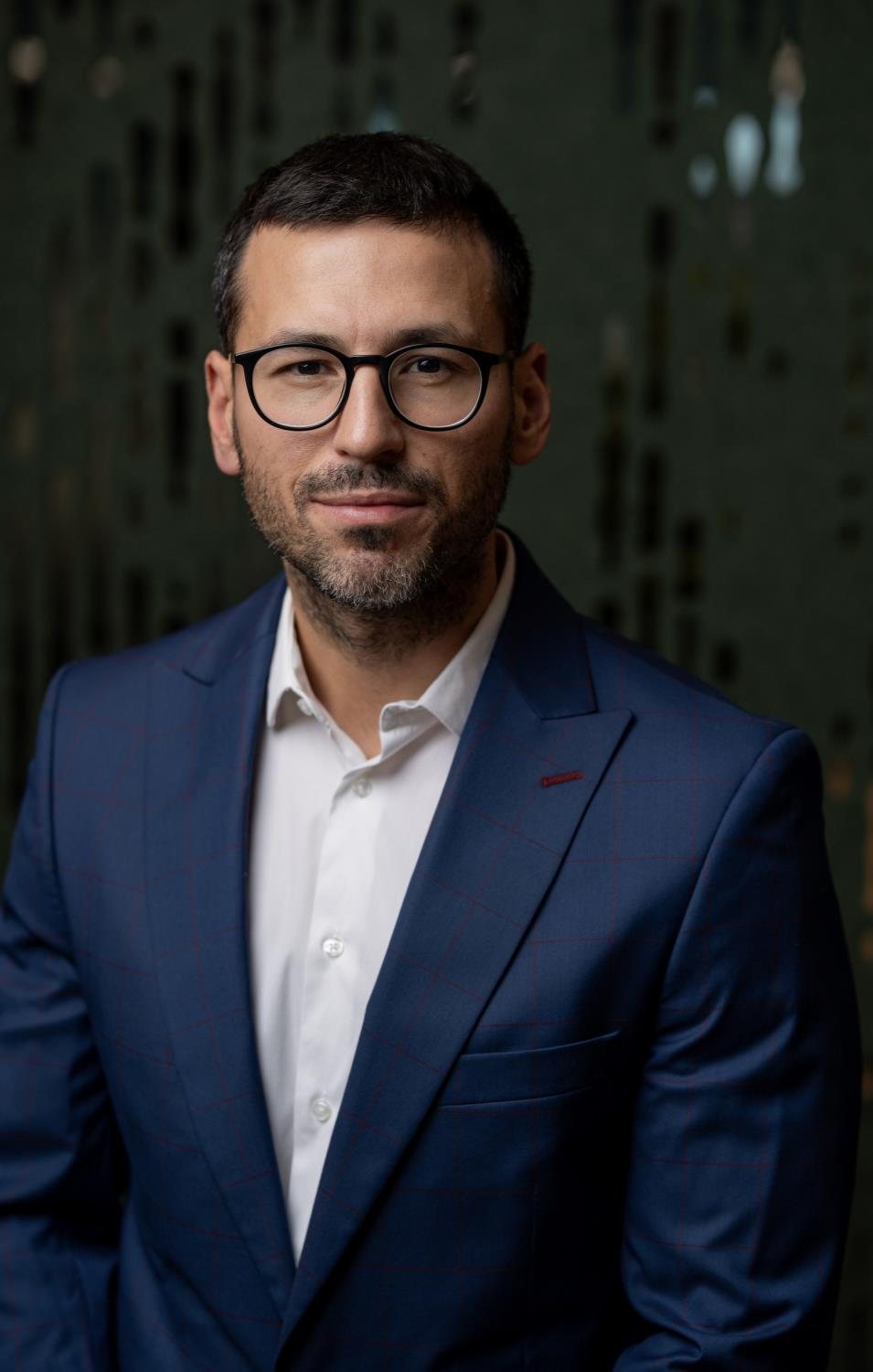 Portrait of George Lazar, COO of Supertree and head of Design and Build